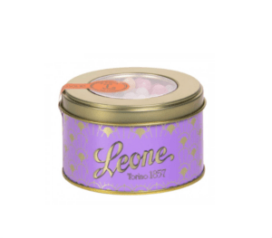 Tin of tangerine hard candy with a pink and white label.